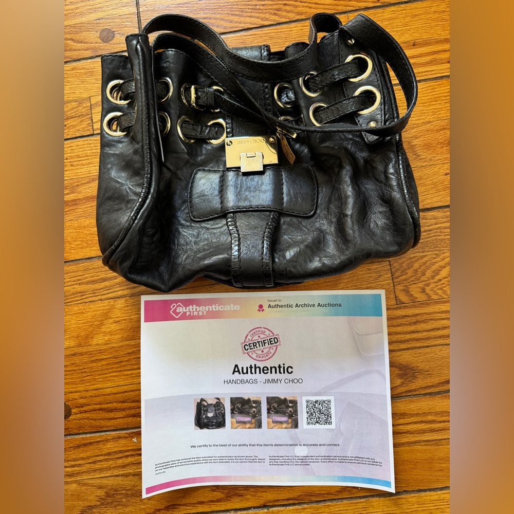 Jimmy Choo bag with unique grommets